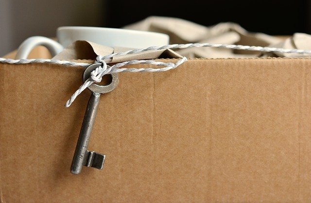 Box full of packed belongings.